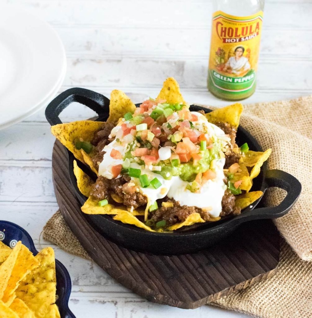 Doritos nachos in cast iron dish.