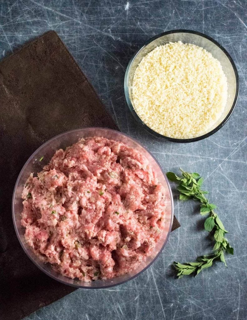 Raw meatball mixture and panko breadcrumbs.