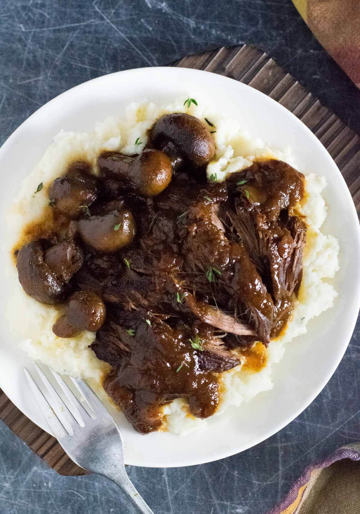 Venison pot roast with mashed potatoes.
