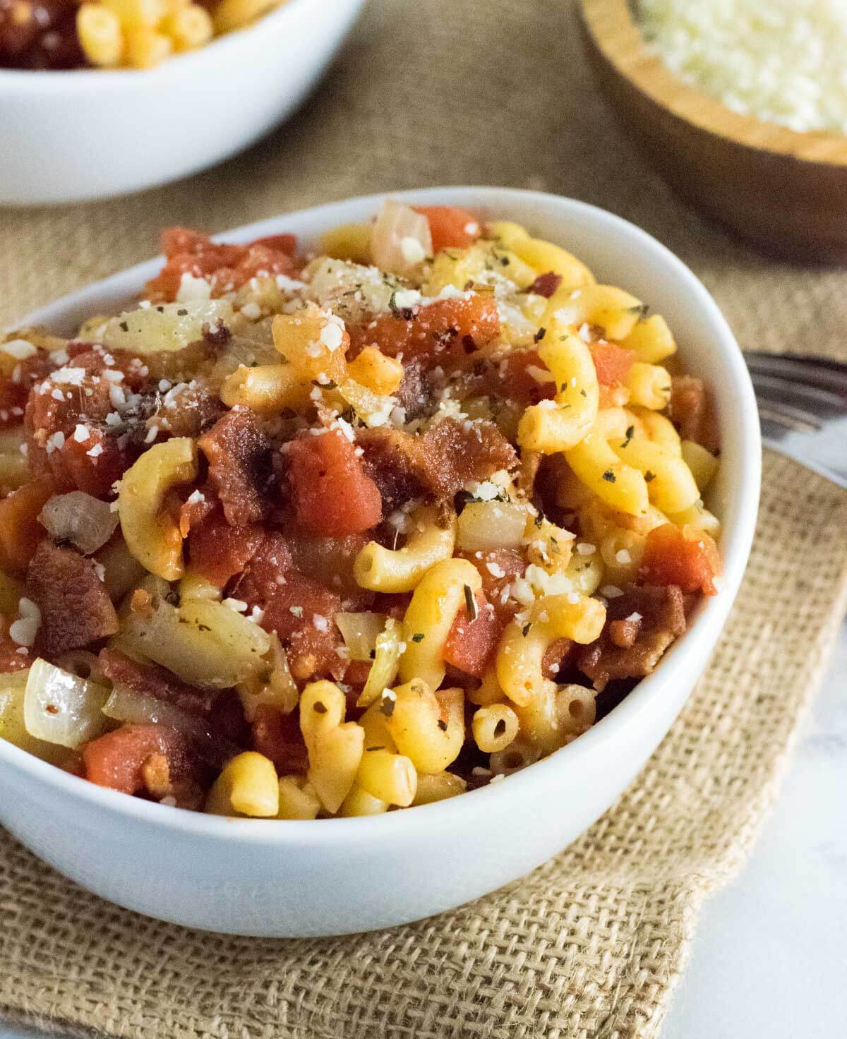 Macaroni and tomatoes in a bowl.