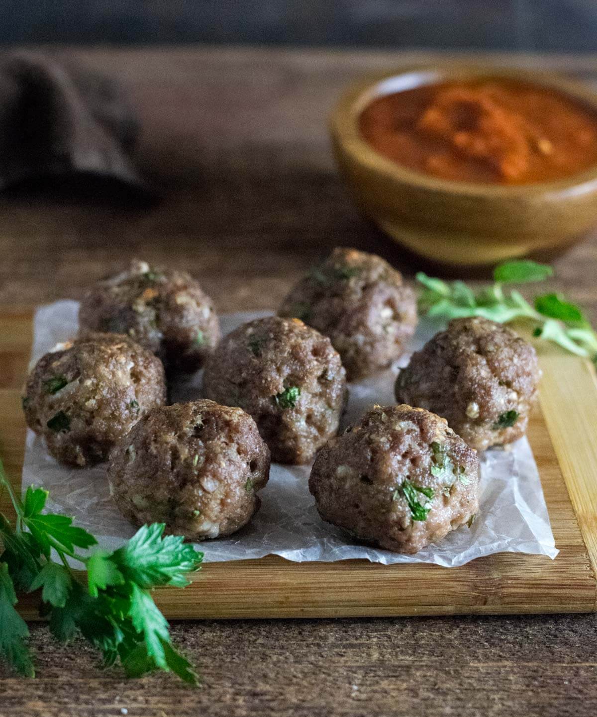 Eggless meatballs served with tomato sauce.