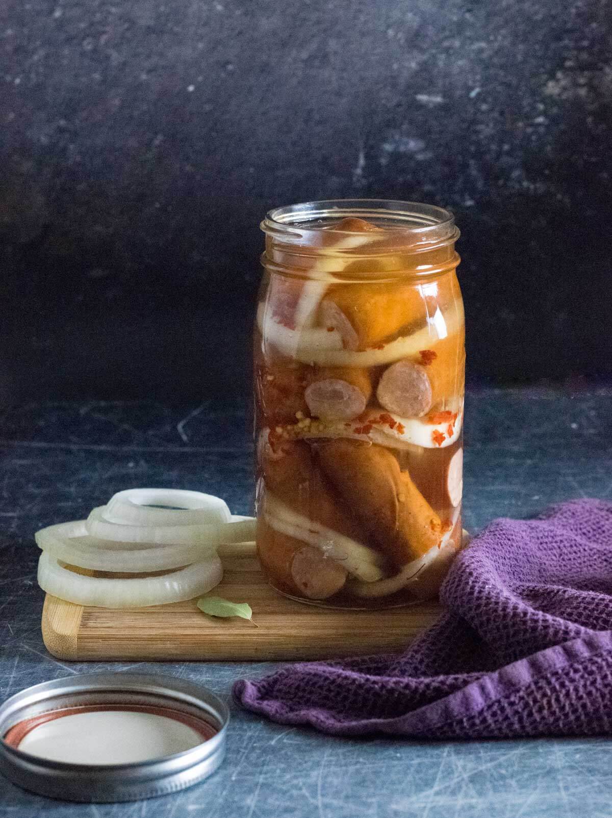Pickled sausage in jar.
