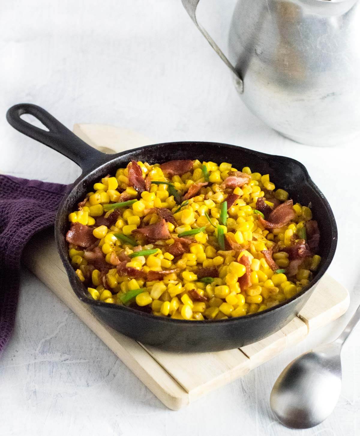 Making southern fried corn with bacon. 