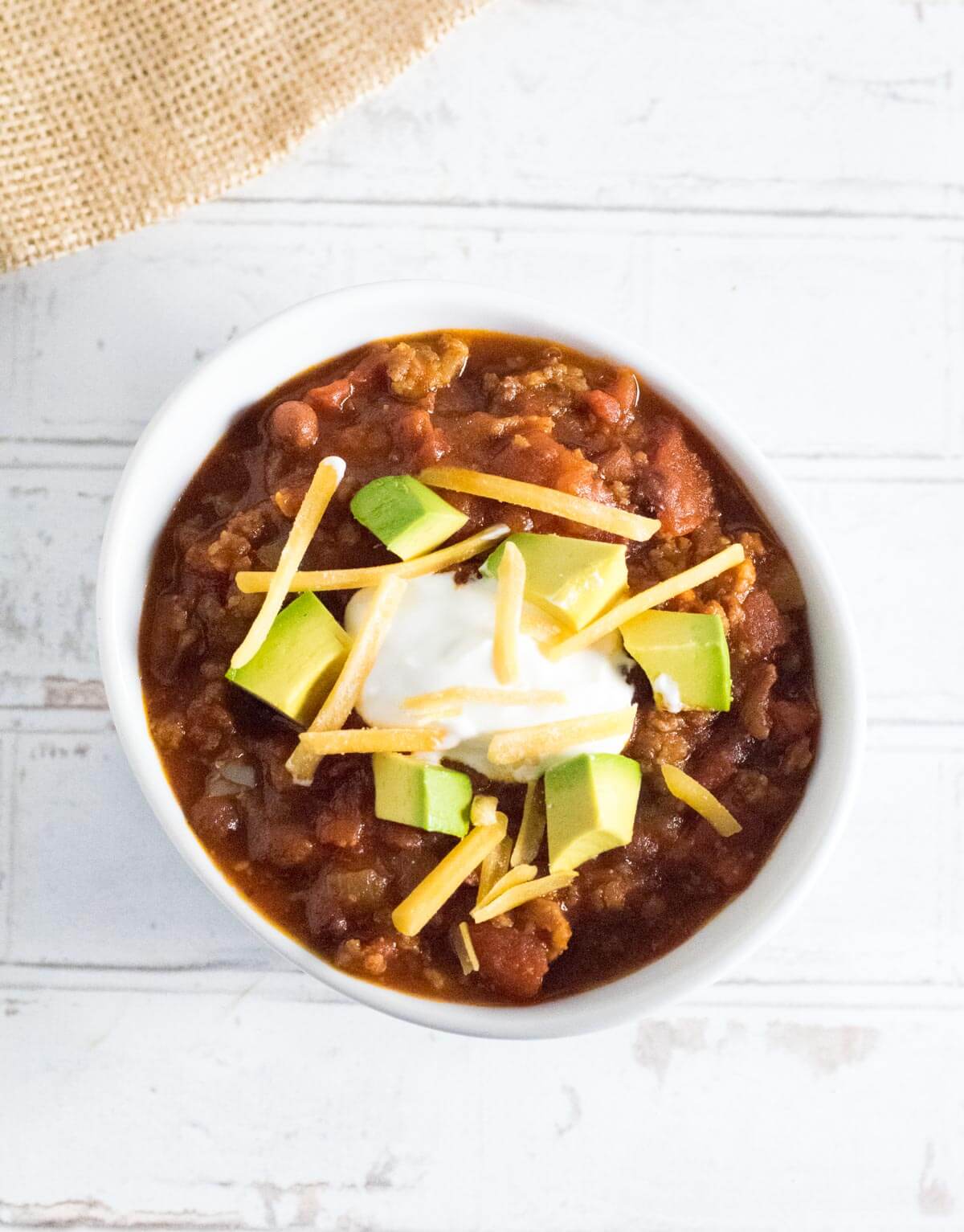 Breakfast chili in a white bowl.