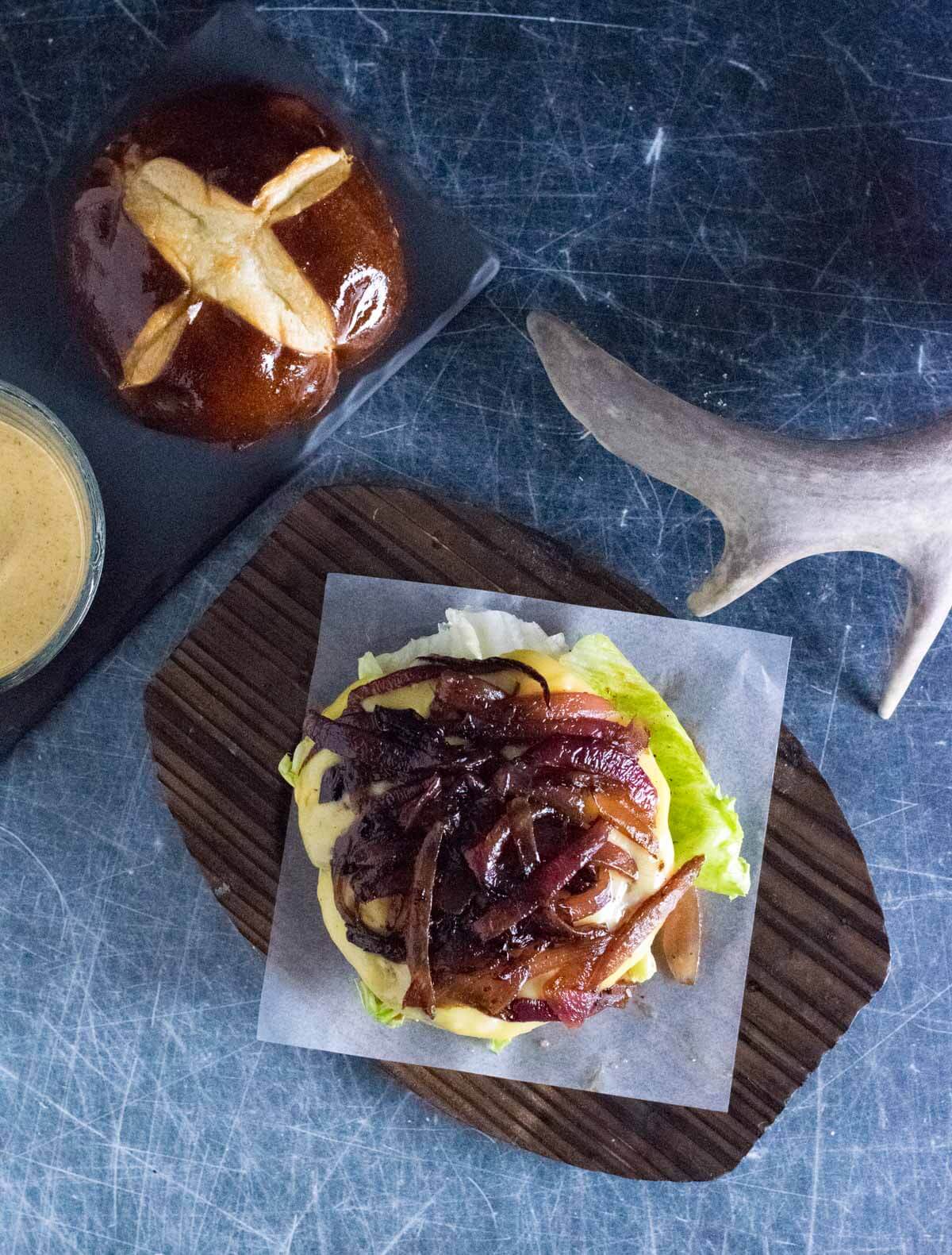 Caramelized onions on deer meat burger.