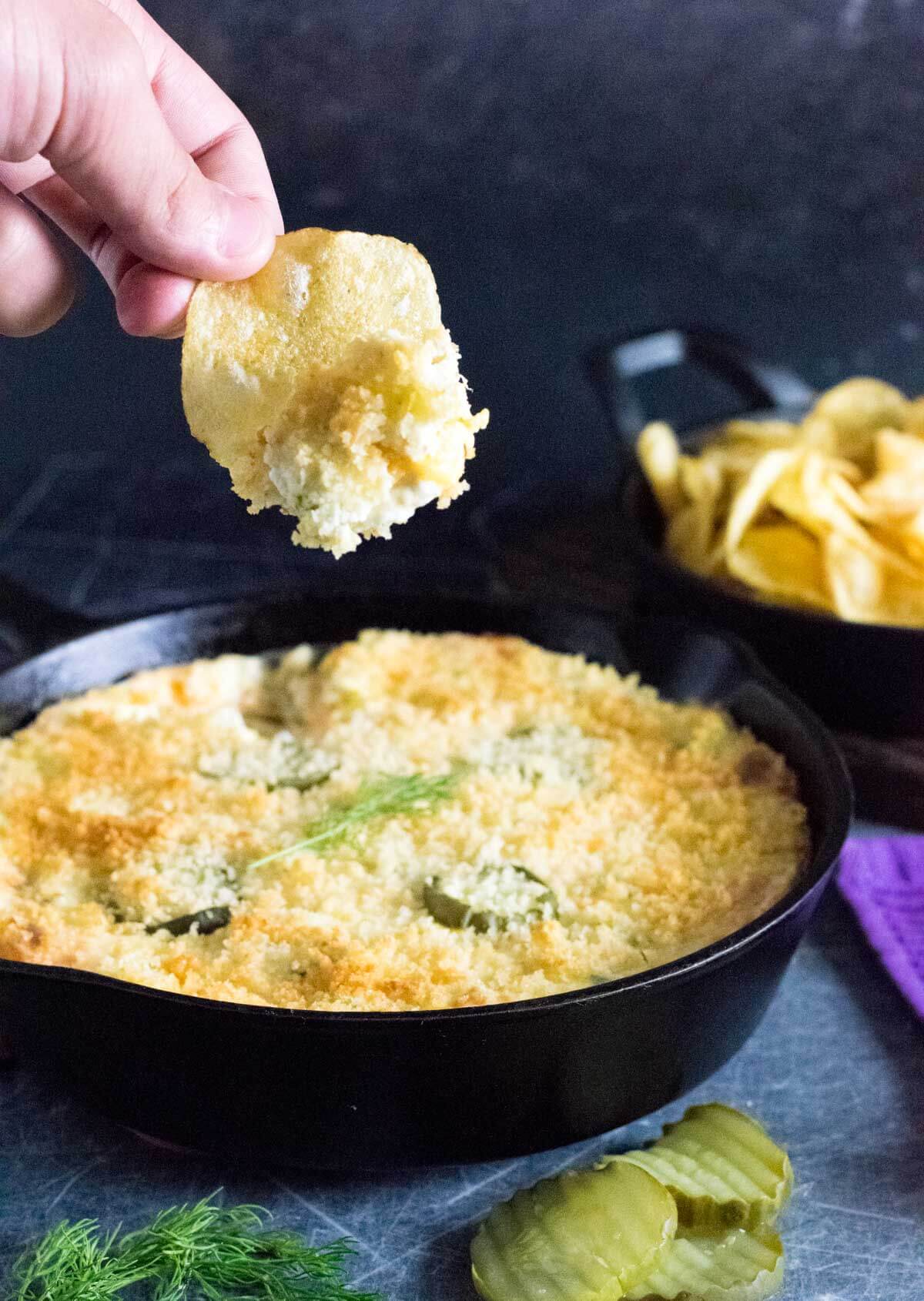 Serving fried pickle dip.