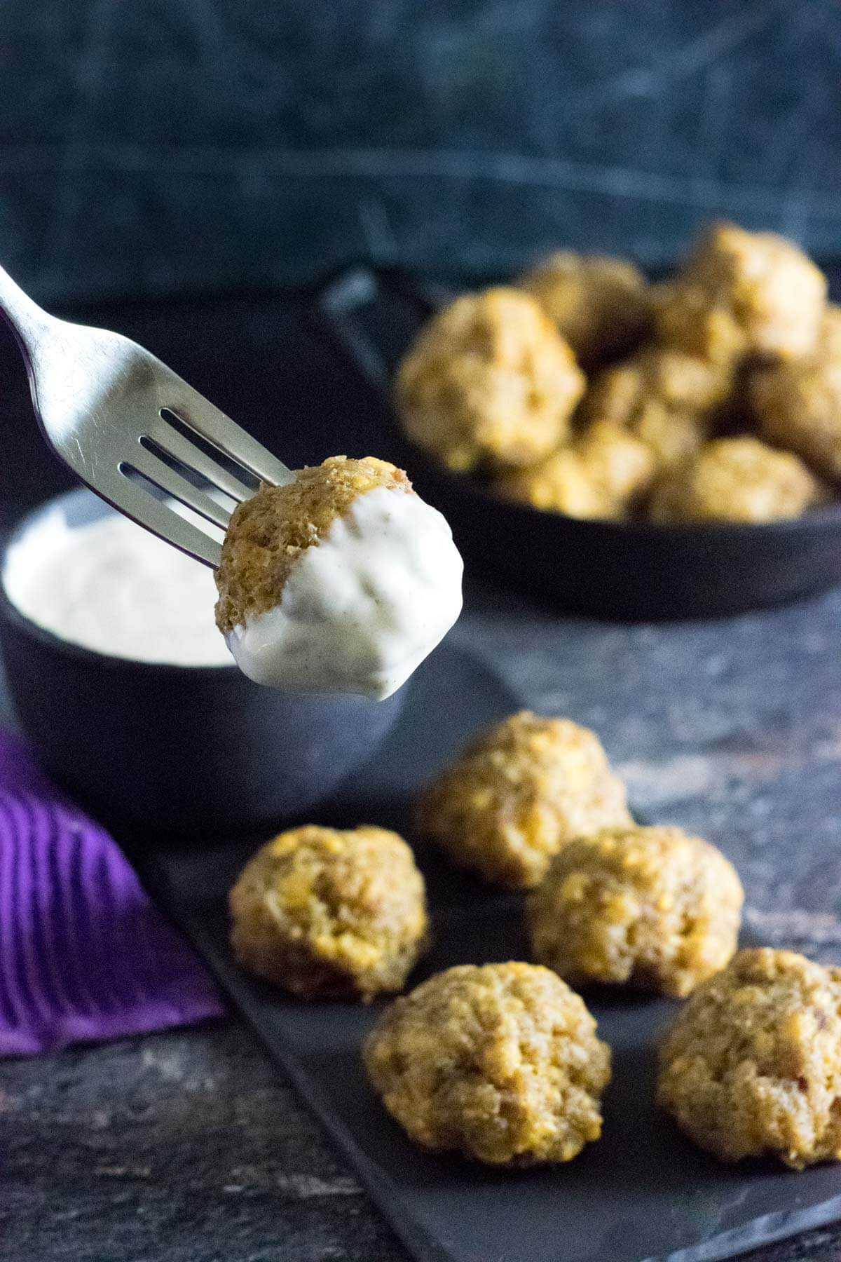 Sausage balls with dipping sauce.