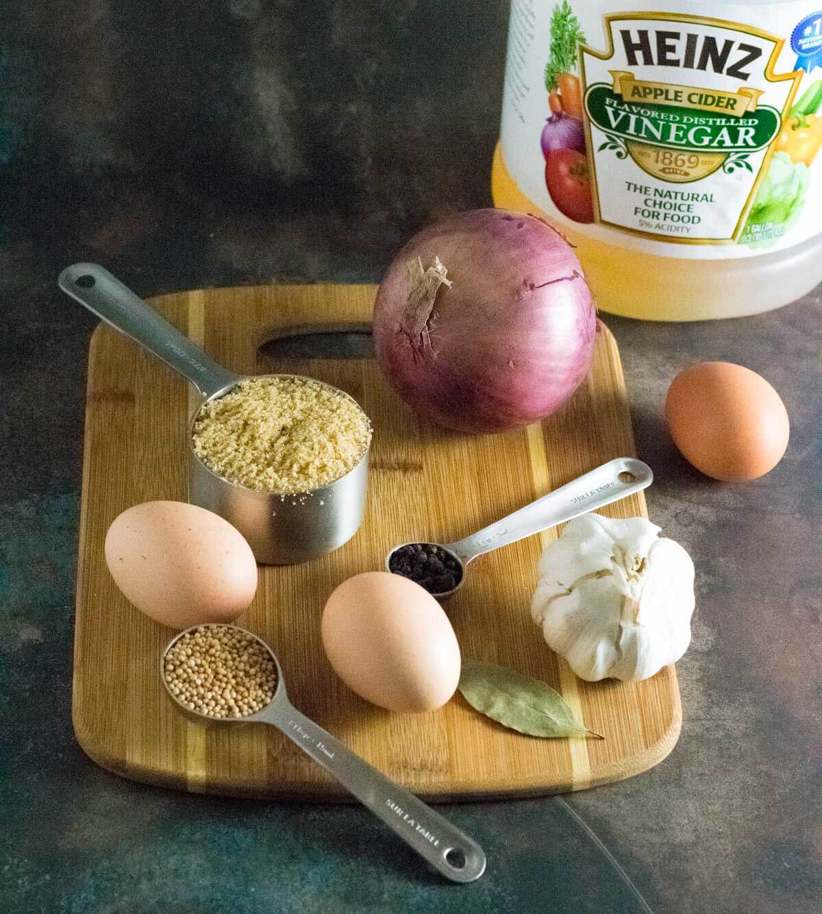 Showing ingredients for pickled eggs with apple cider vinegar.