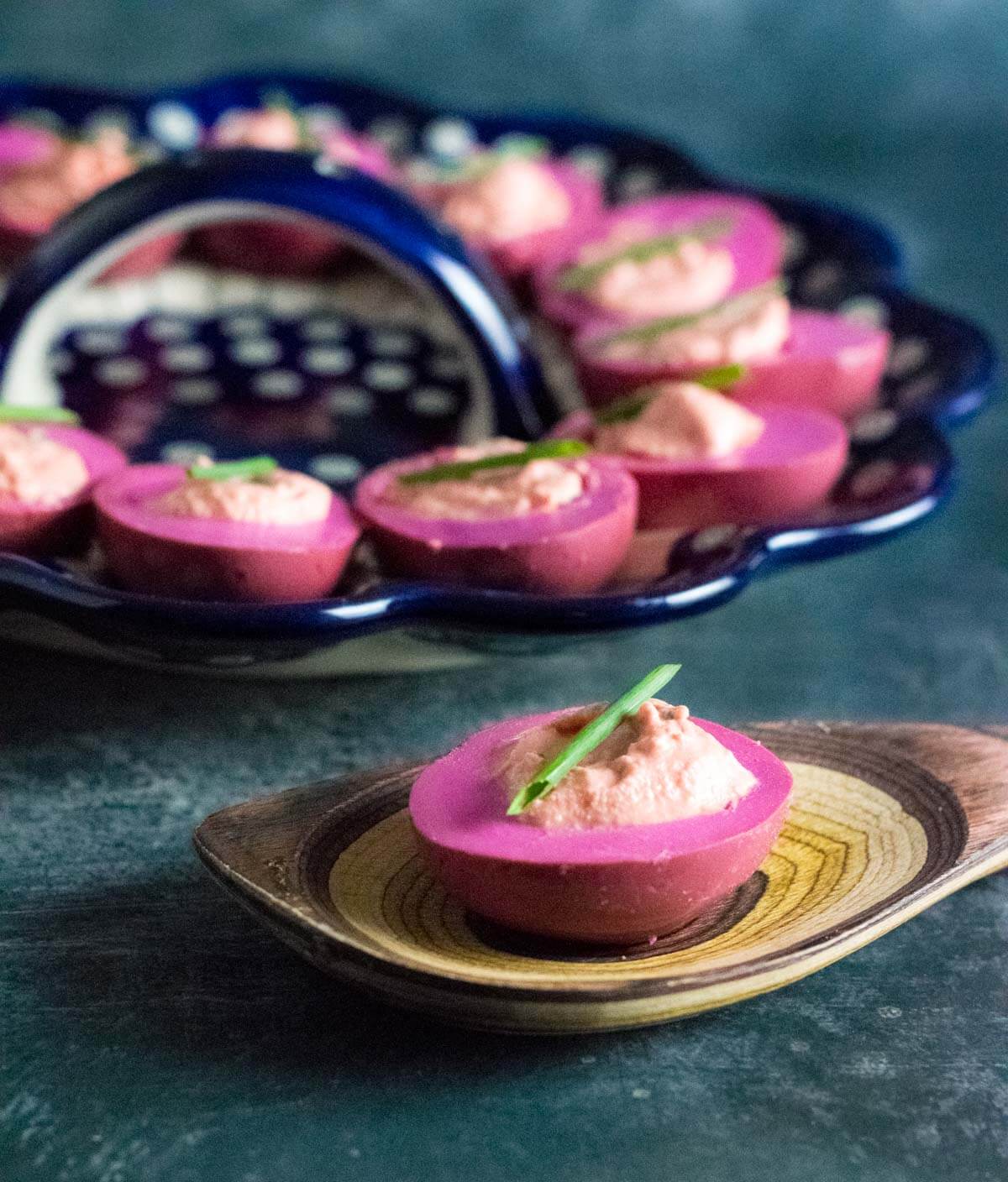 Serving beet pickled deviled eggs.