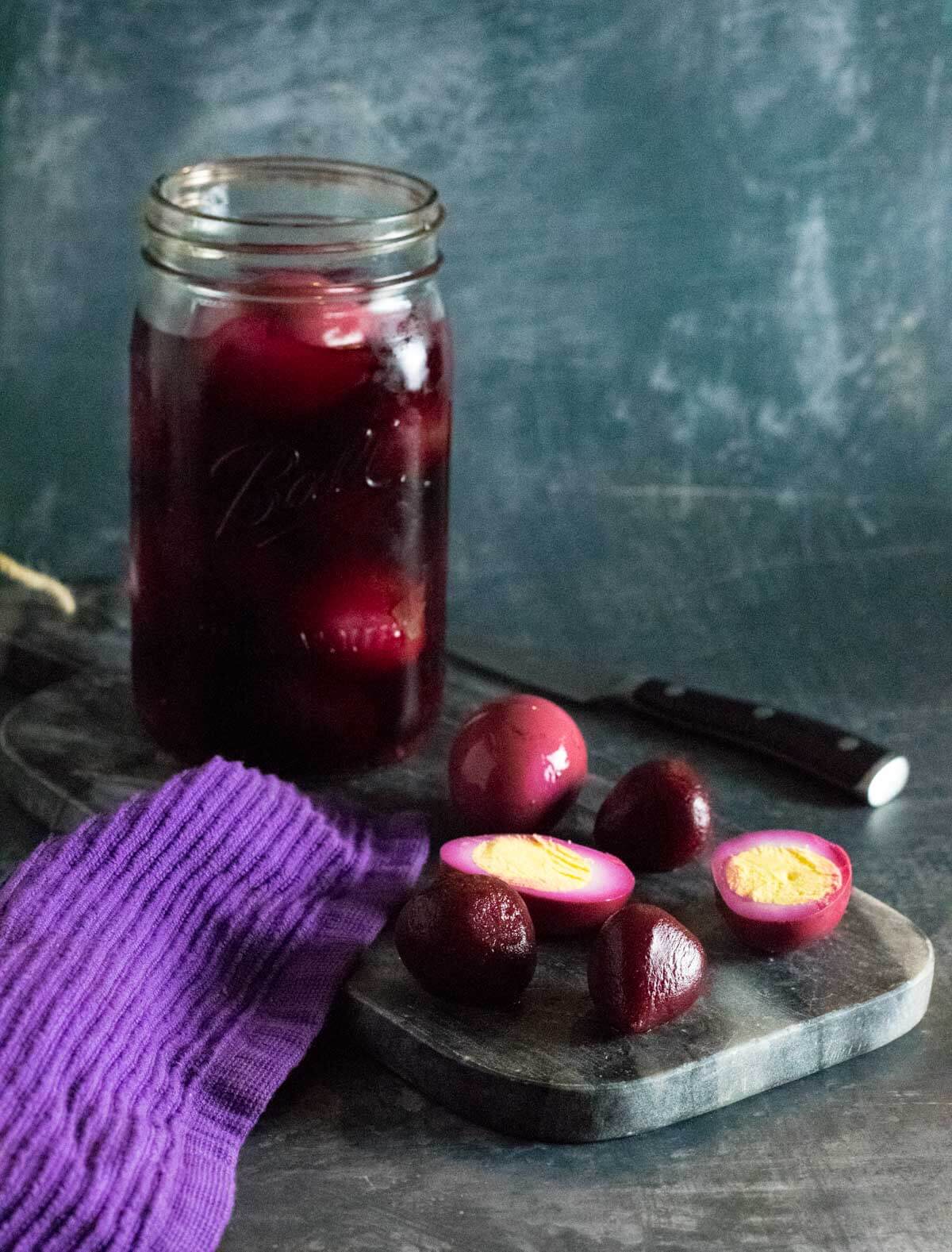 Serving pickled eggs with beets.