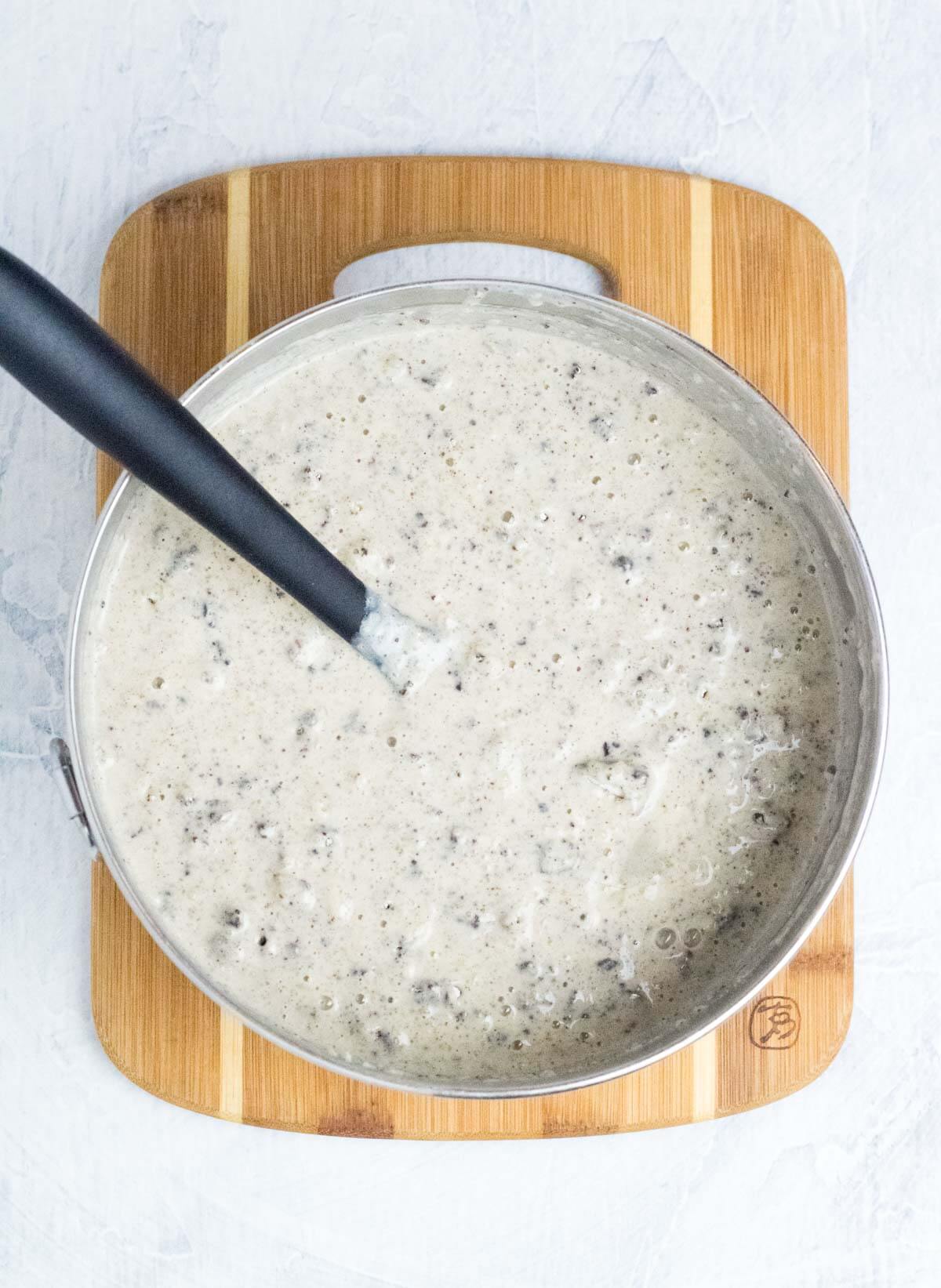 Making Oreo pancake batter.