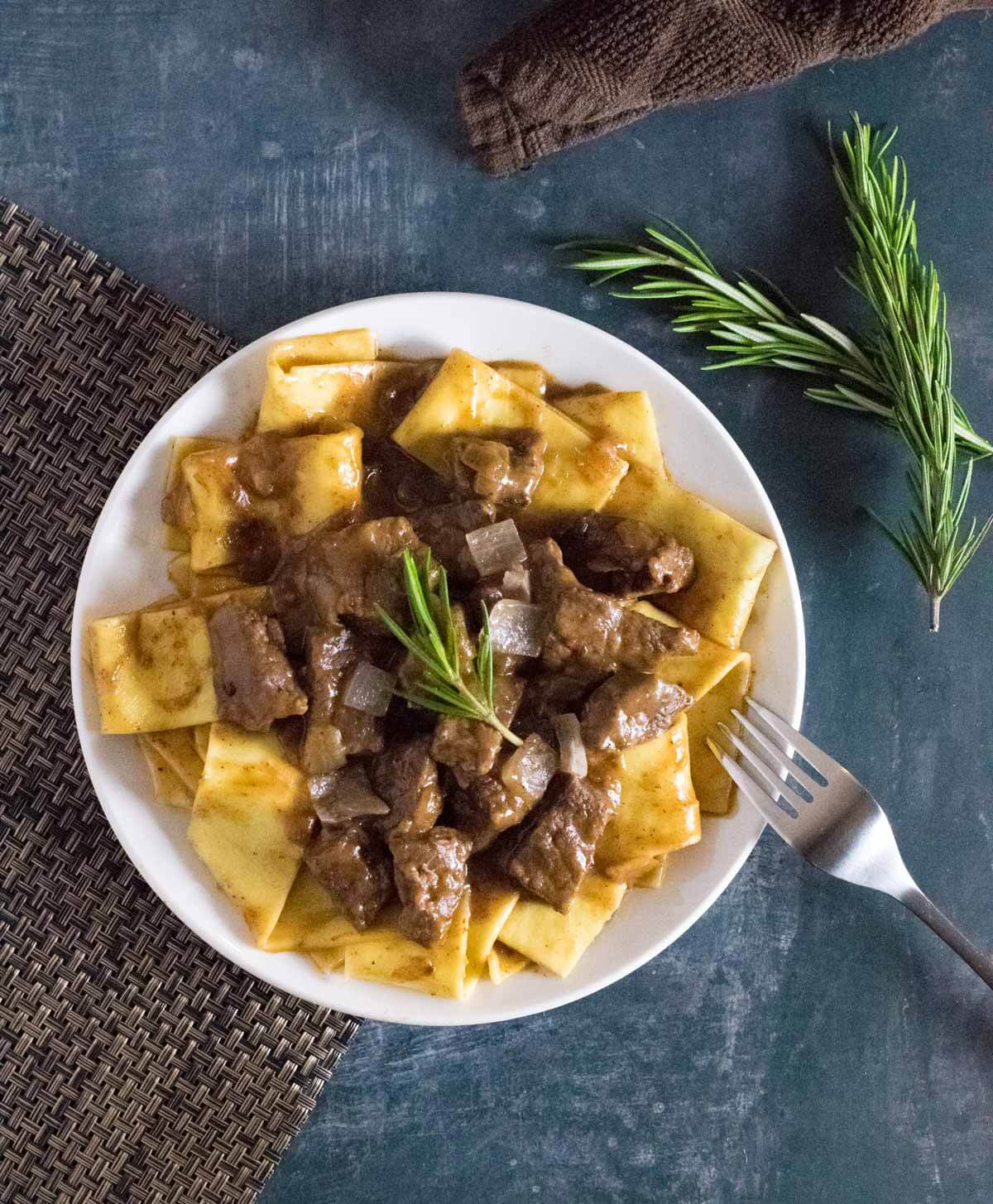 Steak and noodles.