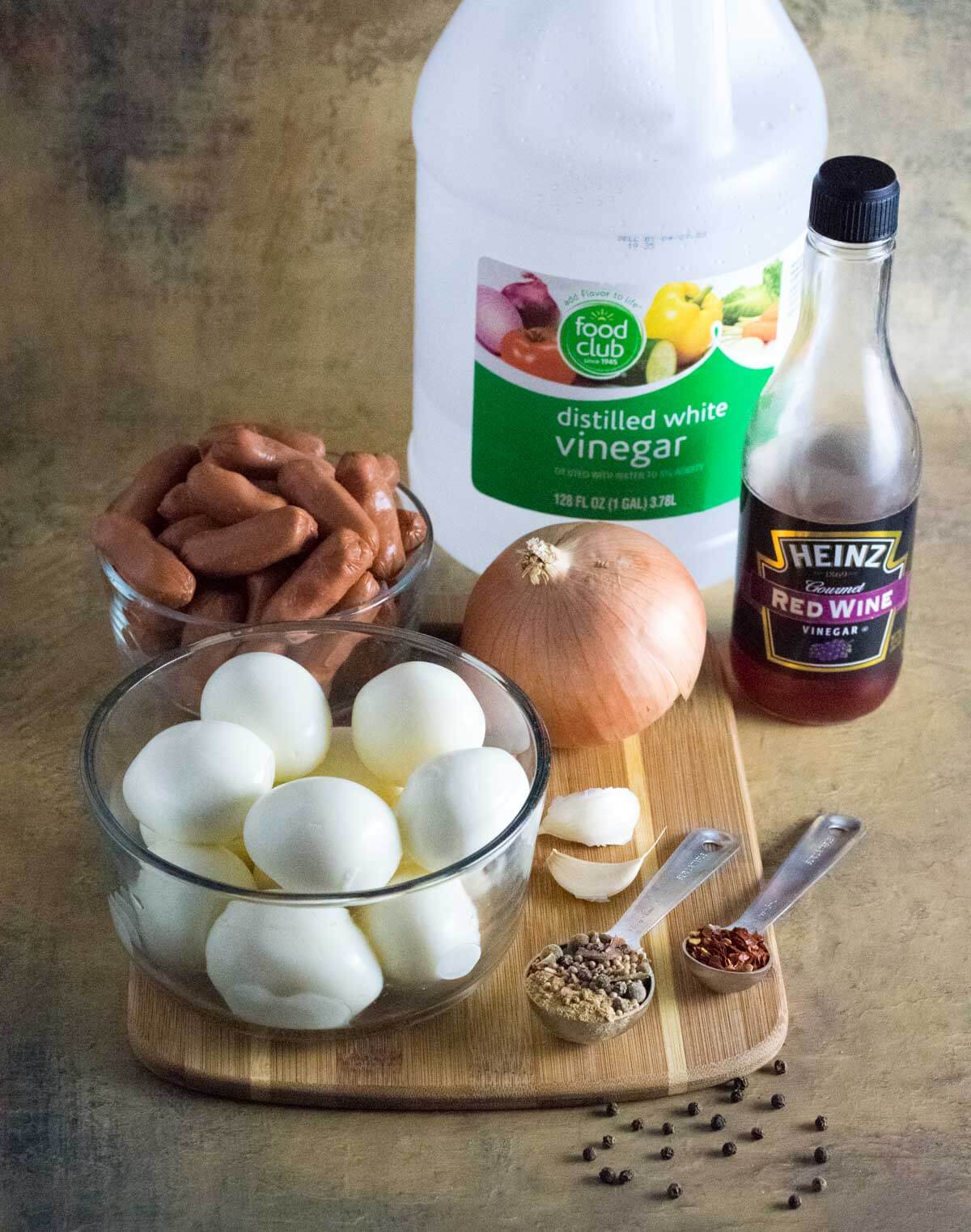 Showing pickled eggs and sausage ingredients.