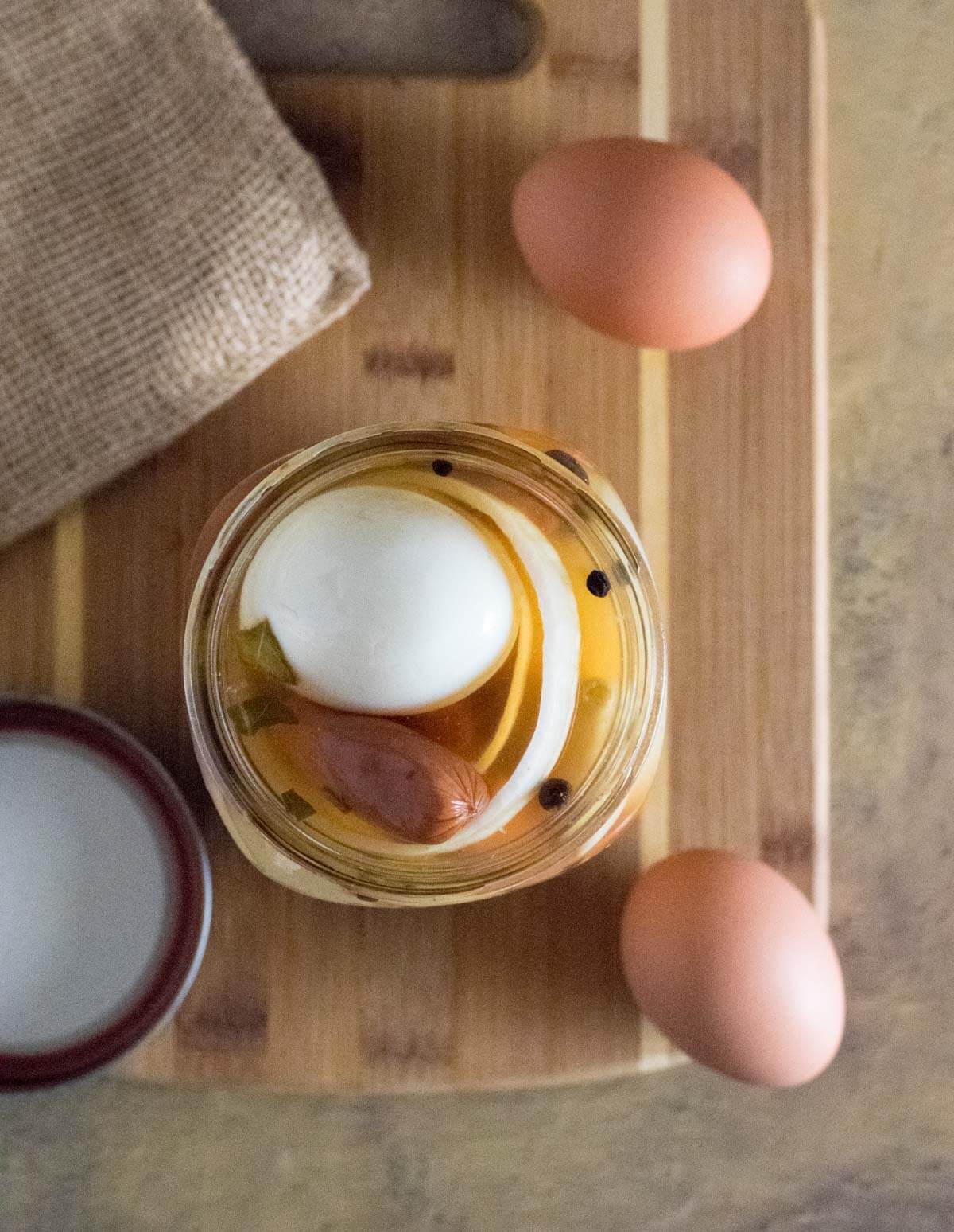 Storing refrigerated pickled eggs and sausage.