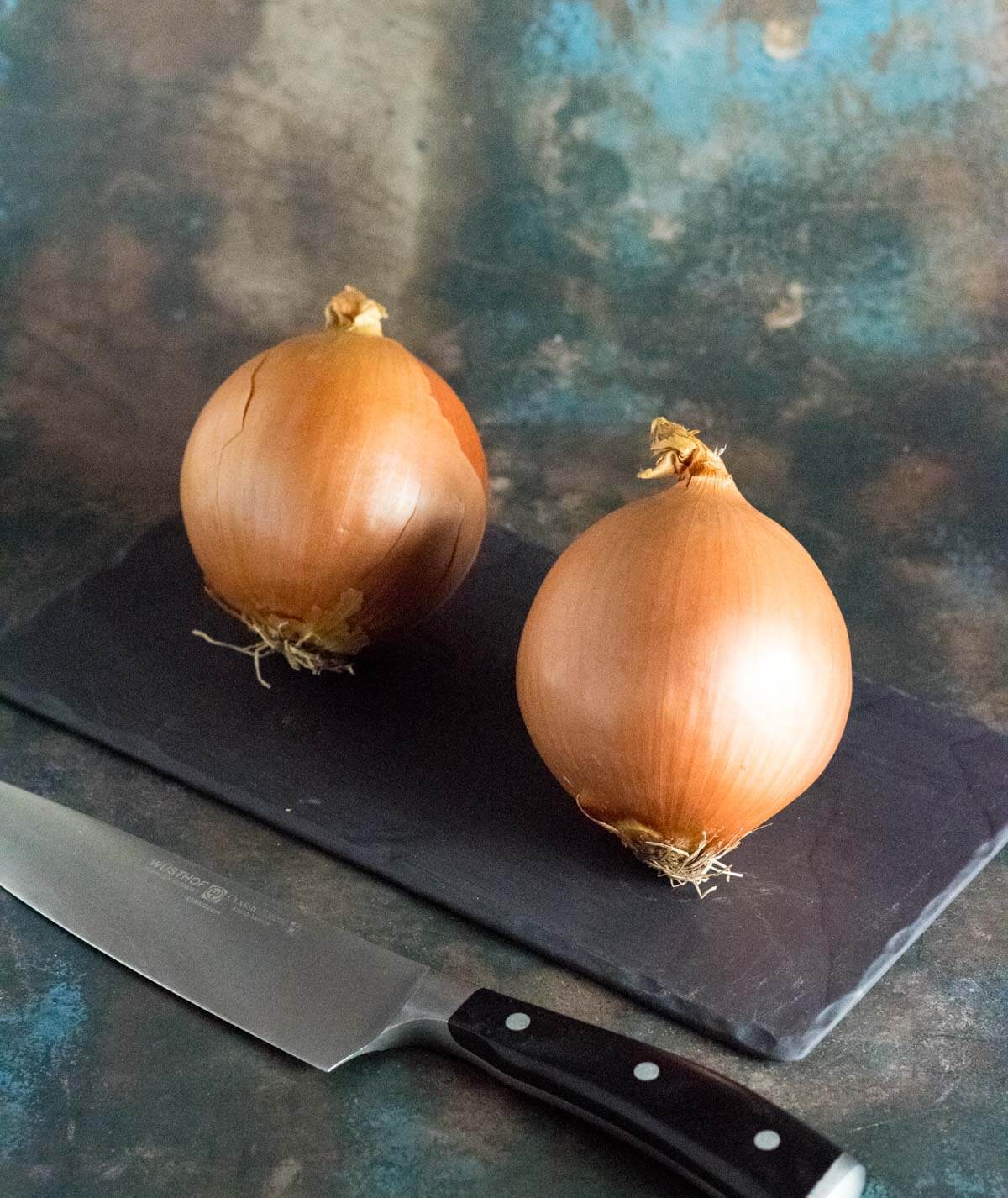 Whole onions with a sharp knife.