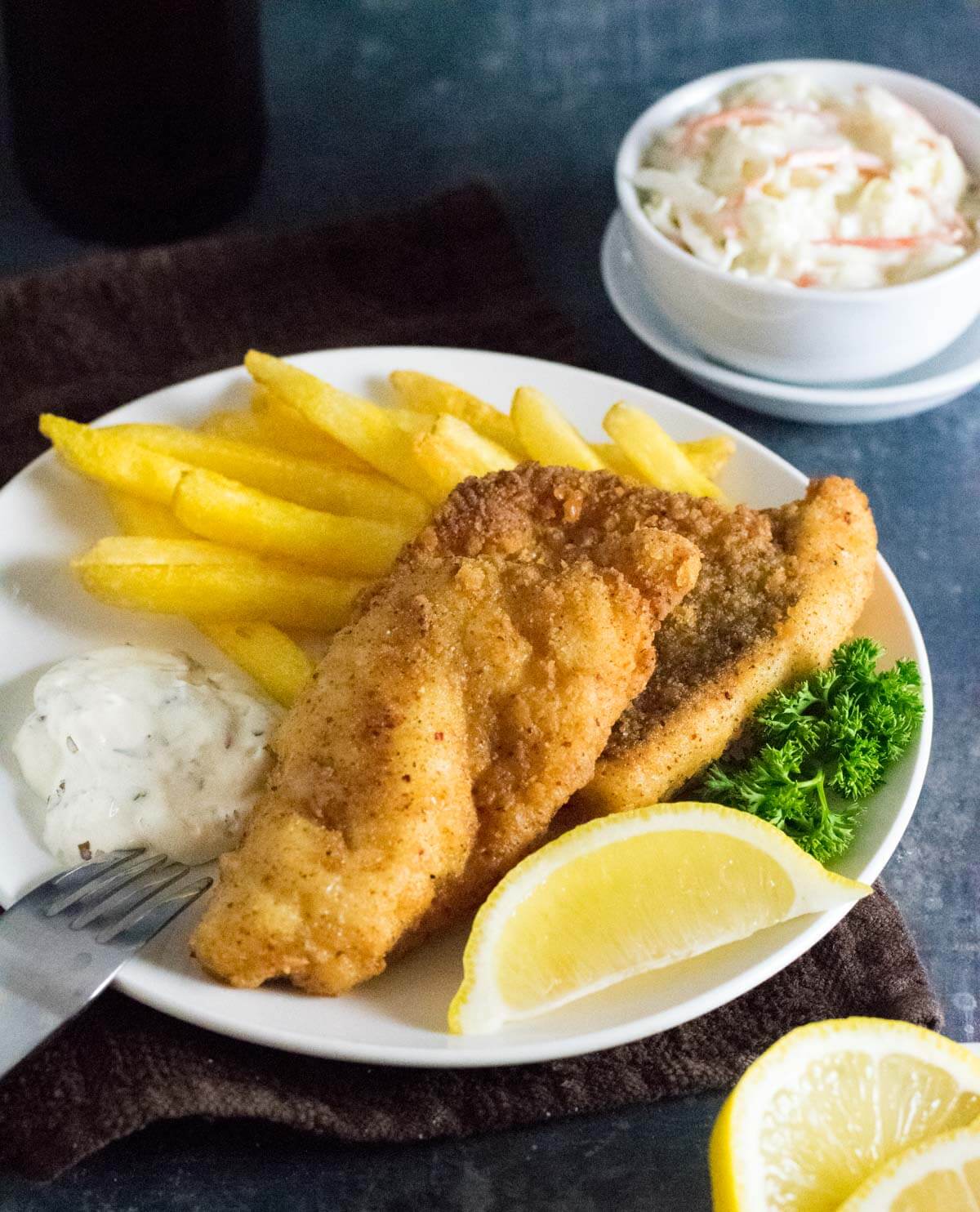 Serving pan fried walleye fish fry.