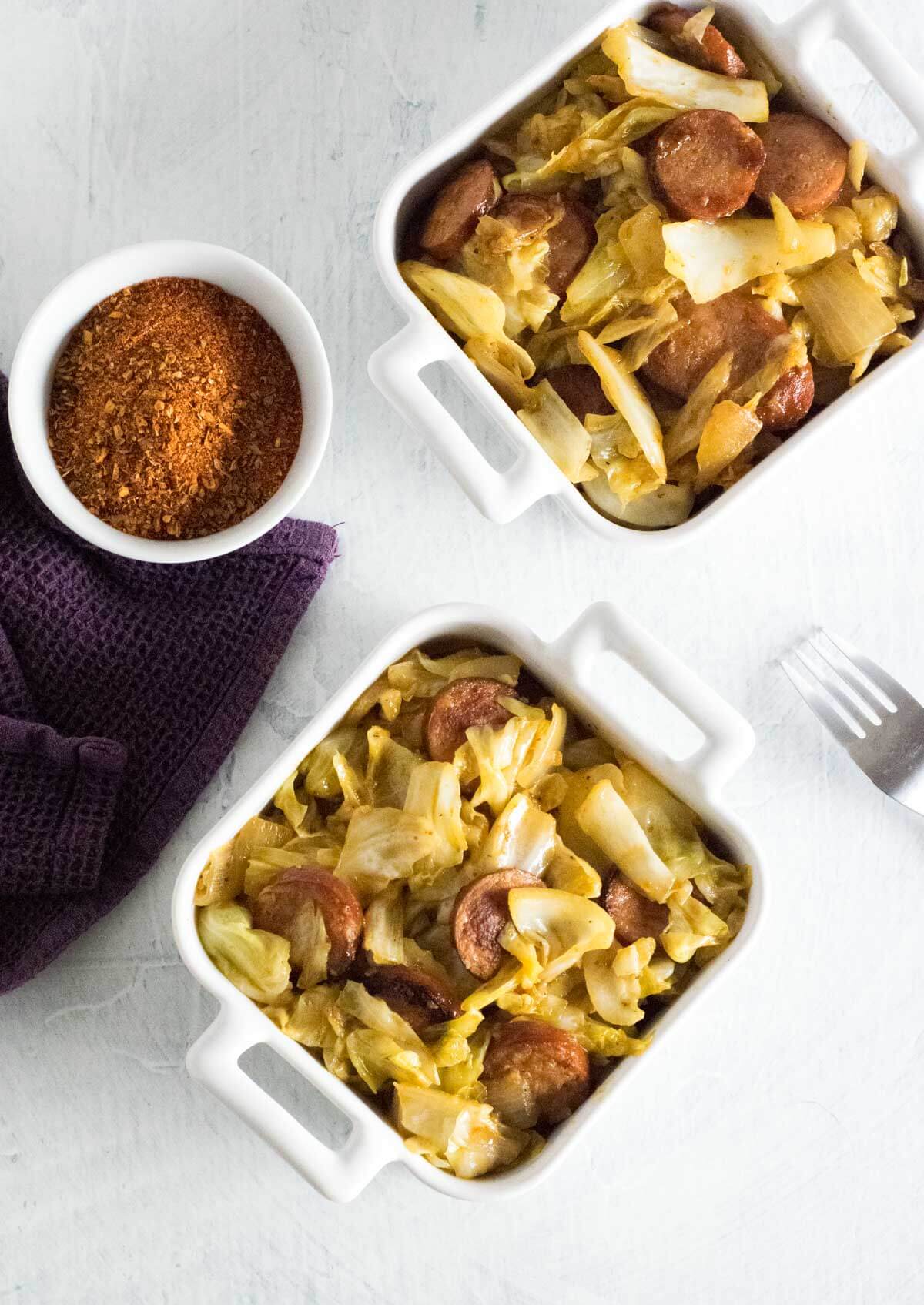 Fried cabbage with sausage.