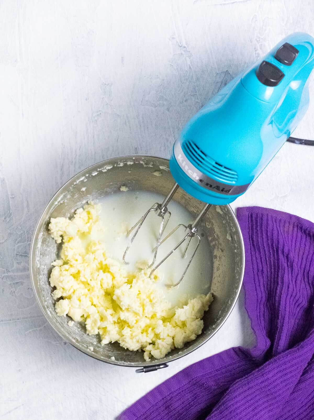 Mixing heavy cream to make butter.