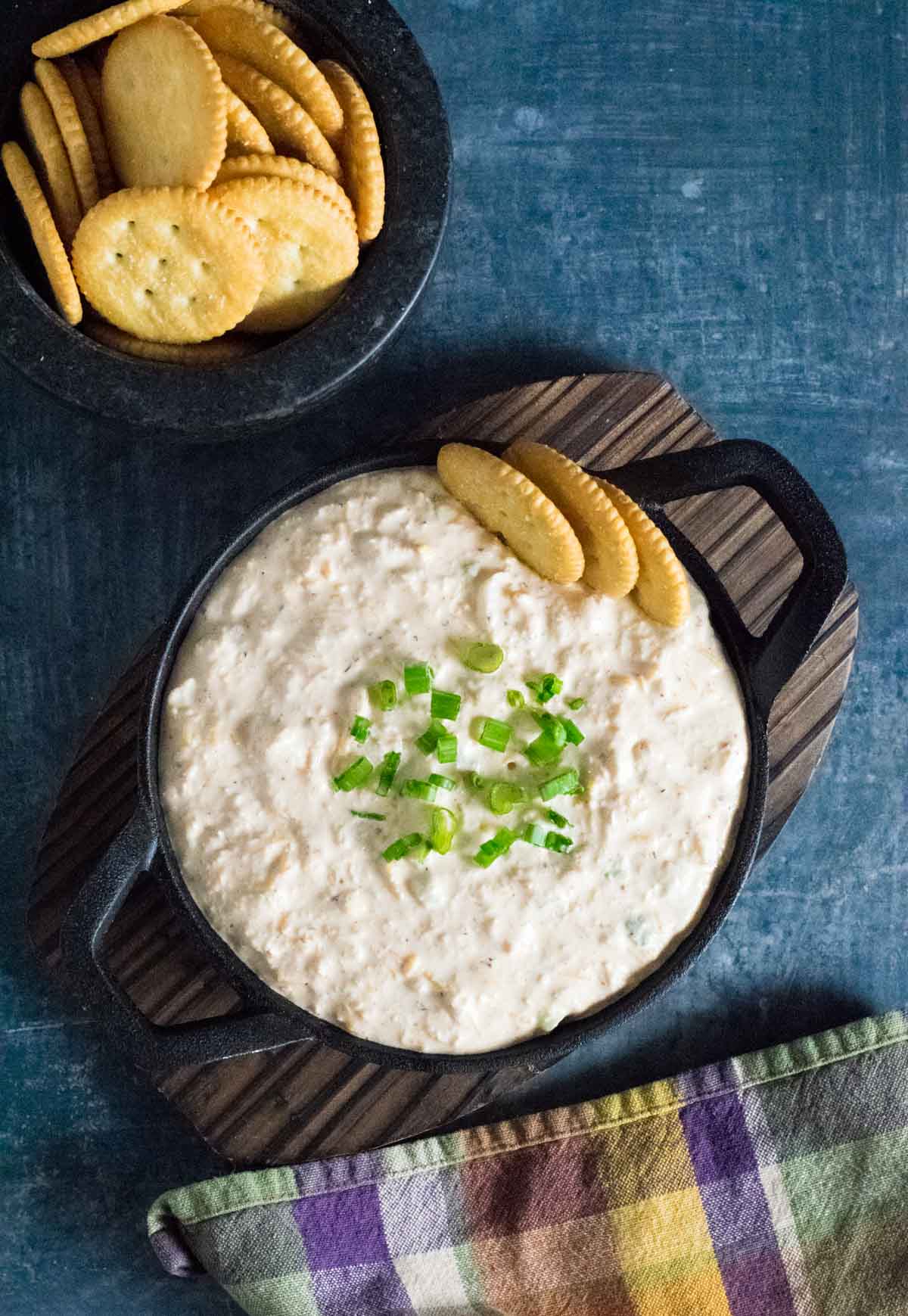 Serving Cajun crab dip.