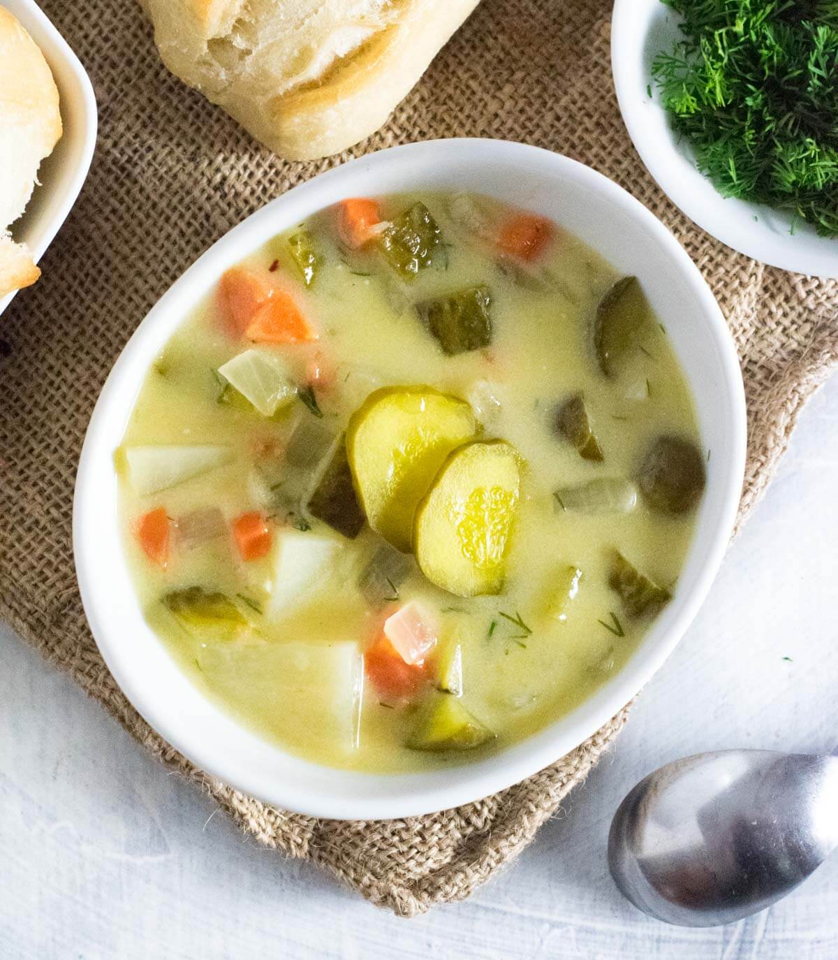 Serving dill pickle soup.