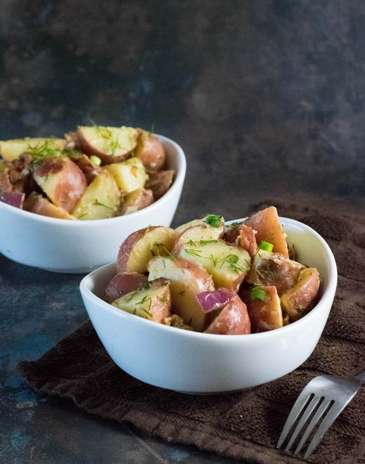 Warm potato salad with bacon.