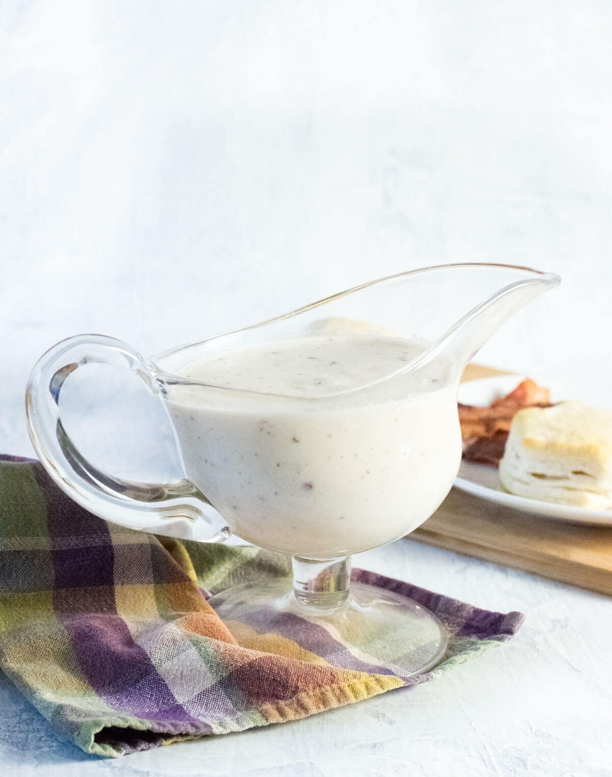 Serving white country gravy.
