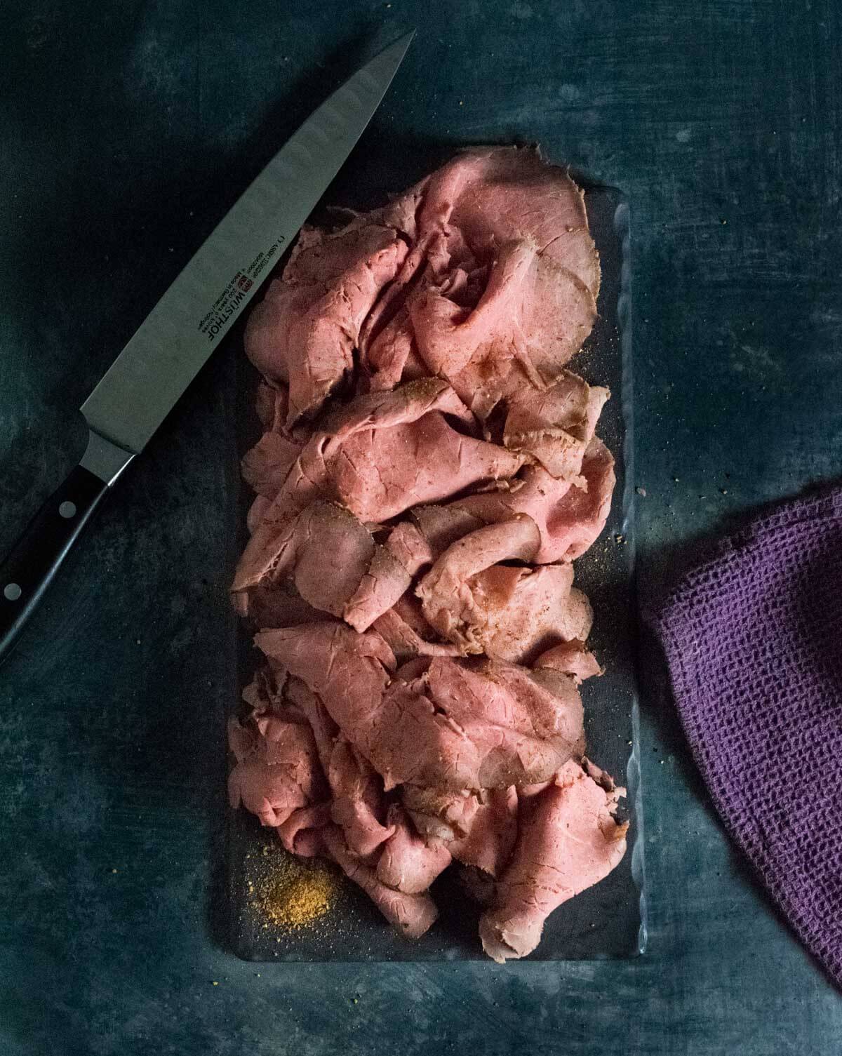 Sliced smoked roast beef.