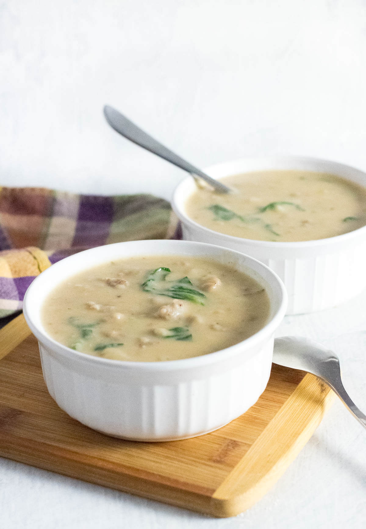 Serving potato soup with Italian sausage.