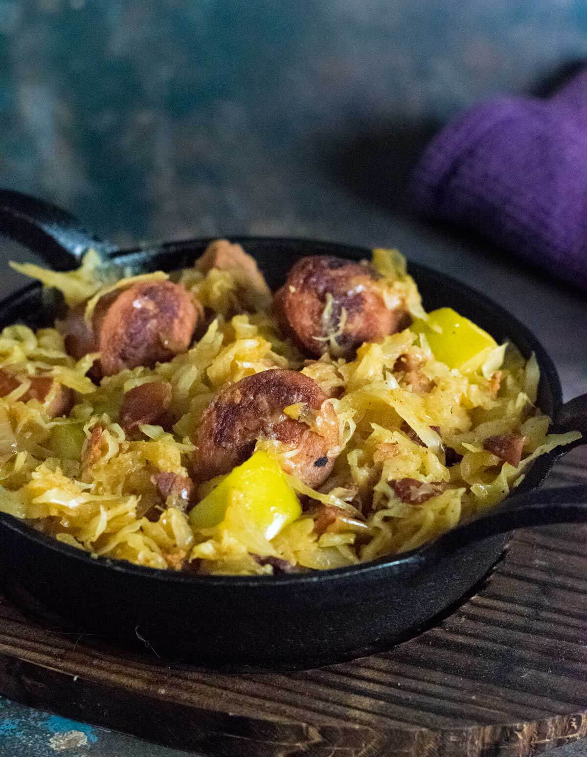 Serving sausage and sauerkraut.