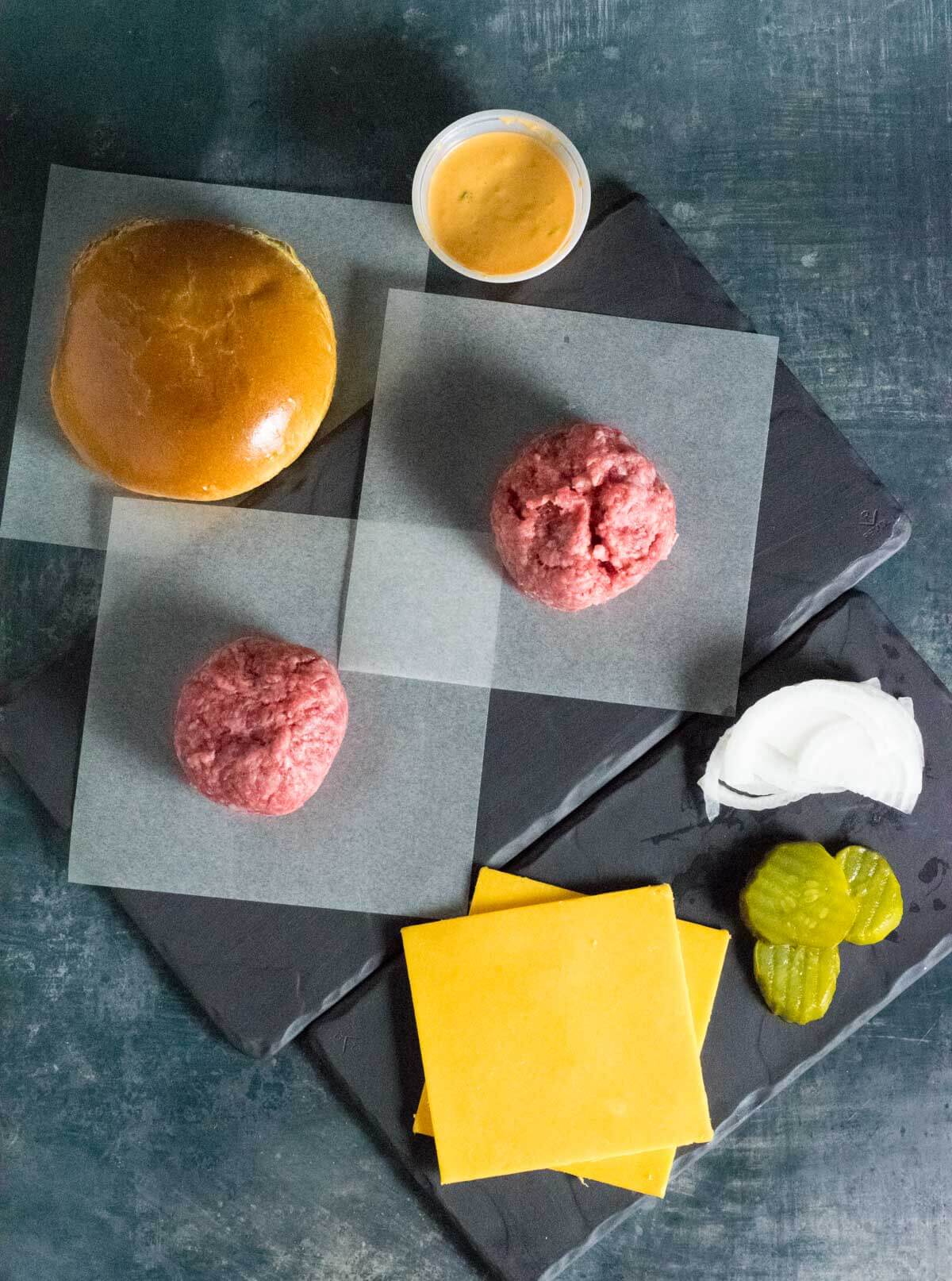 Showing ingredients for making smash burgers.